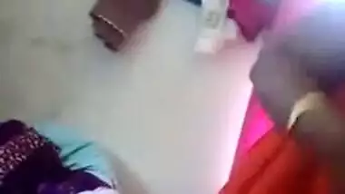 Fatty Indian woman takes off orange dress to join husband for sex