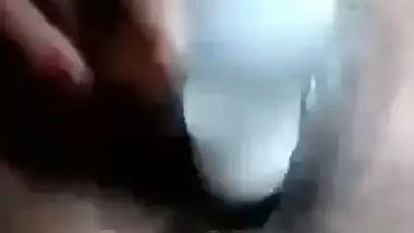 Desi nude girl fucks her pussy with a plastic bottle