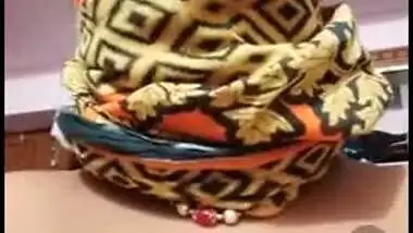 Sexy long-haired Desi mature displaying her nude XXX curves on cam