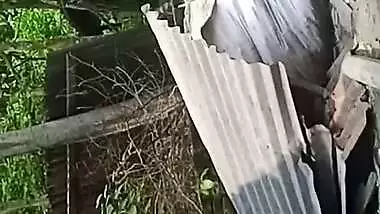 Village neighbor girl outdoor bath caught through hole