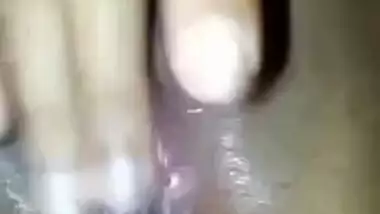 Young Desi woman exposes her shaved XXX opening giving it sex pleasure