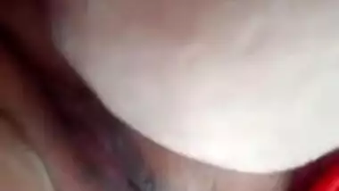 Plump amateur Desi wife in a red sari performs hot XXX striptease