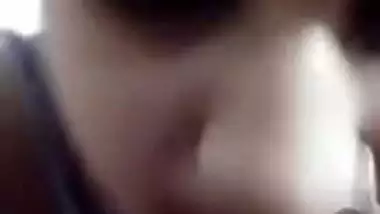 Naughty Desi bhabhi shows tits and fingers her XXX twat on camera