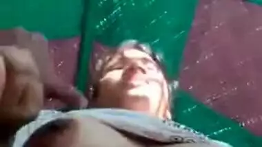 Desi wife poses naked and teases snatch with her fingers in XXX video