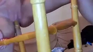 Crazy girl uses chair leg as a sex toy to fuck her pussy
